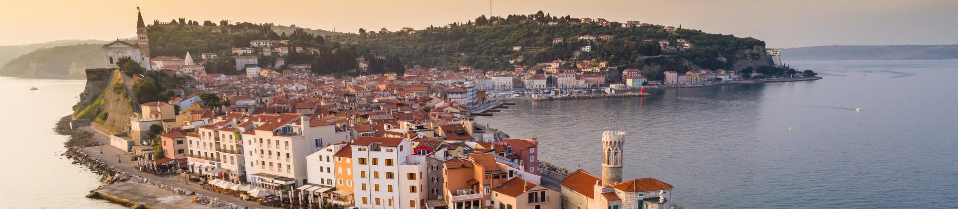 Aerial view of beach in Piran at sunset time