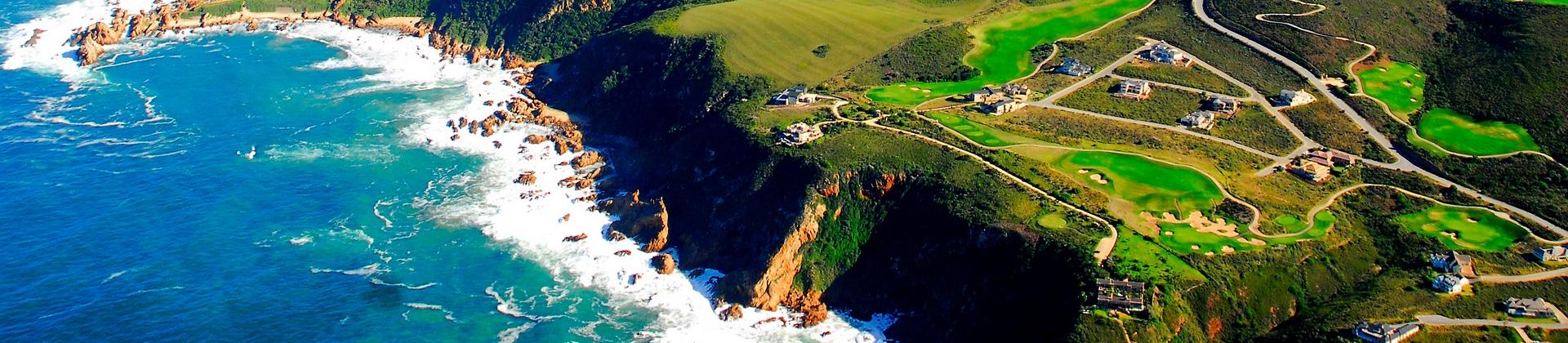 Aerial view of countryside in Knysna on a sunny day with some clouds