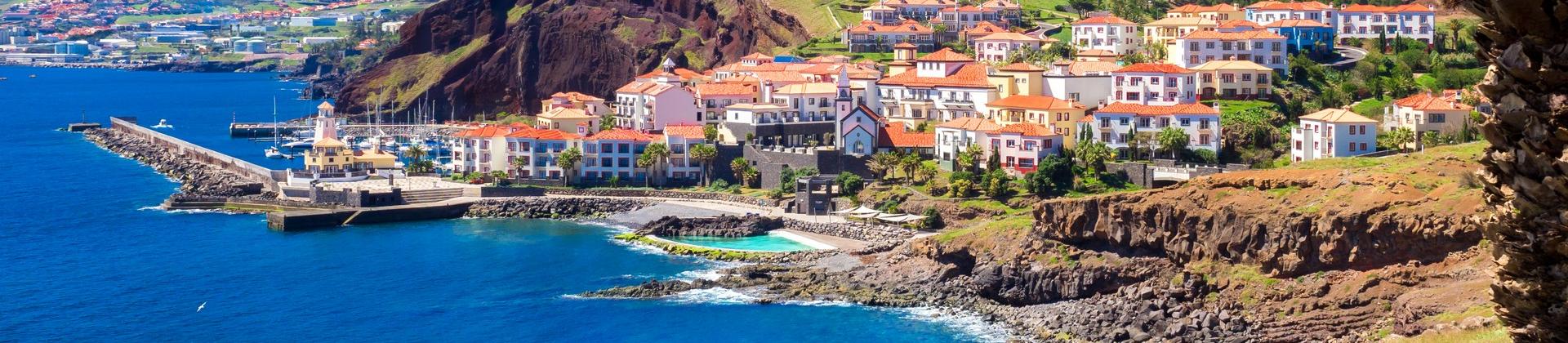 Beach in Madeira in sunny weather with few clouds