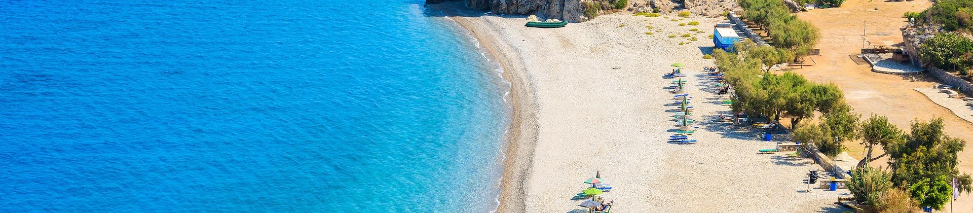 Nice beach by the sea in Samos on a clear sky day