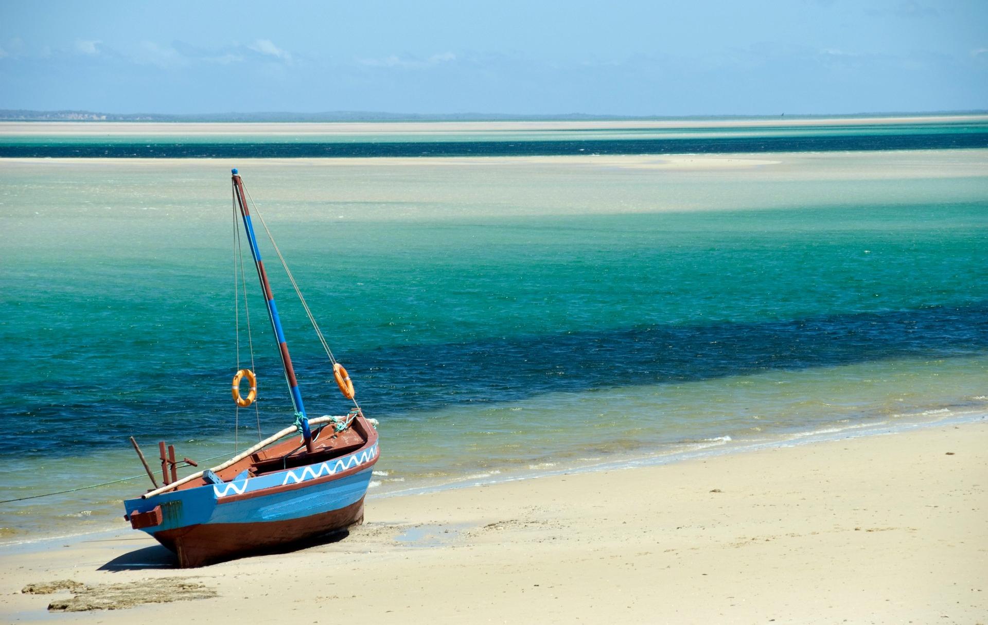 Awesome beach with turquise sea in Mozambique on a clear sky day