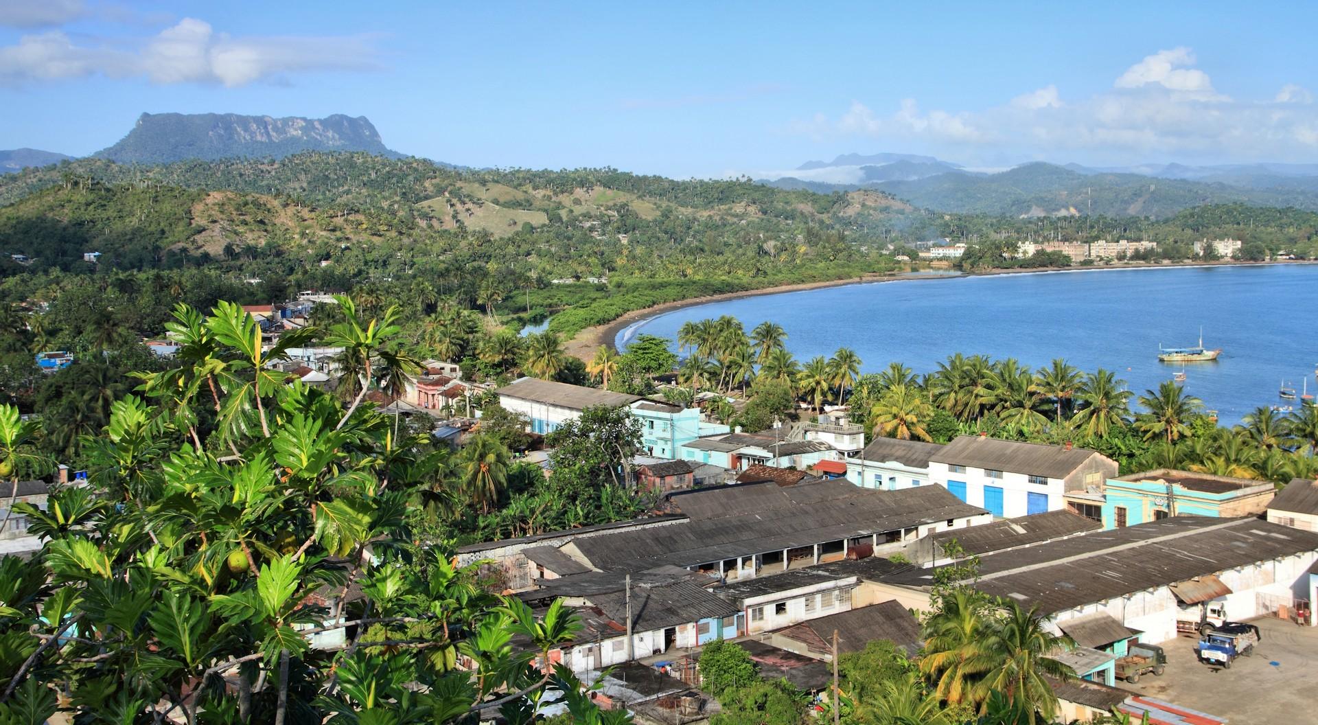 Aerial view of countryside in Baracoa in sunny weather with few clouds