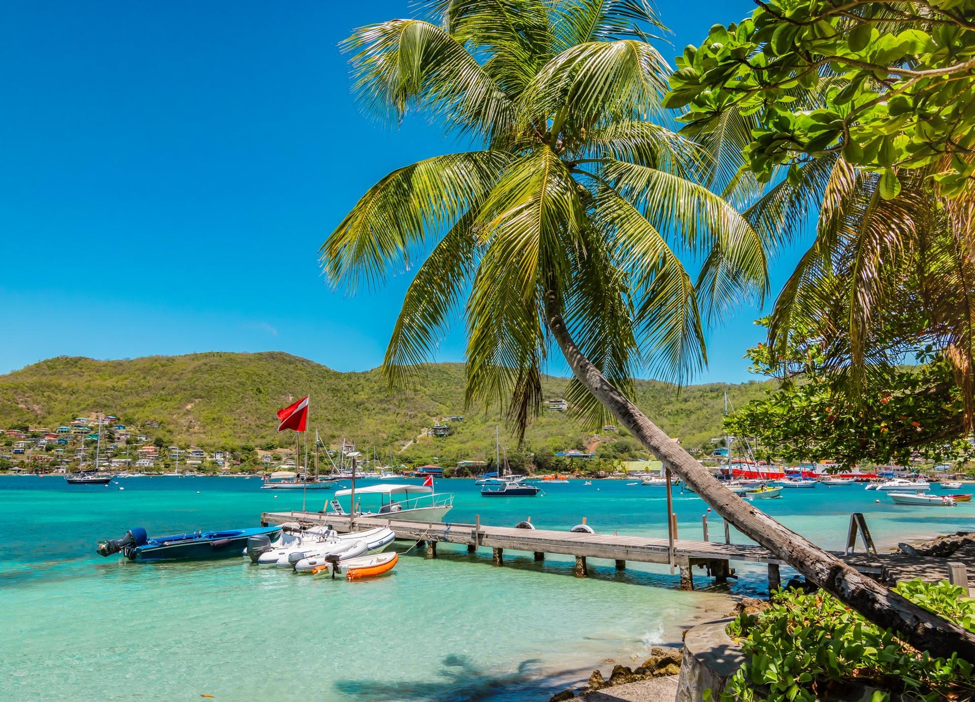 Amazing beach with turquise sea in Bequia Island with nice weather and blue sky