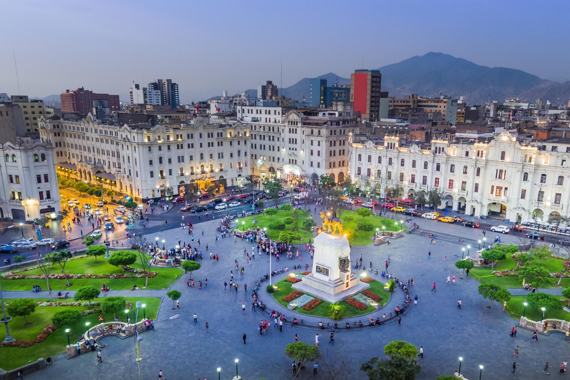 Aerial view of city square in Lima at sunset time