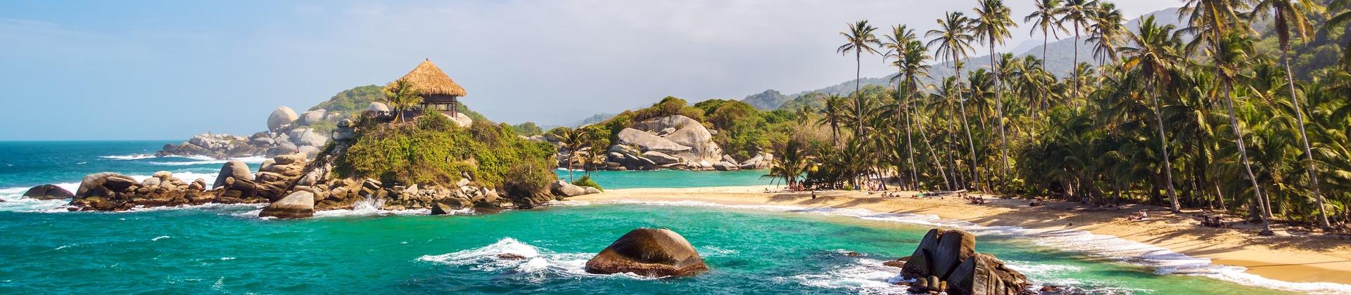 Beach with turquise sea near Santa Marta in sunny weather with few clouds