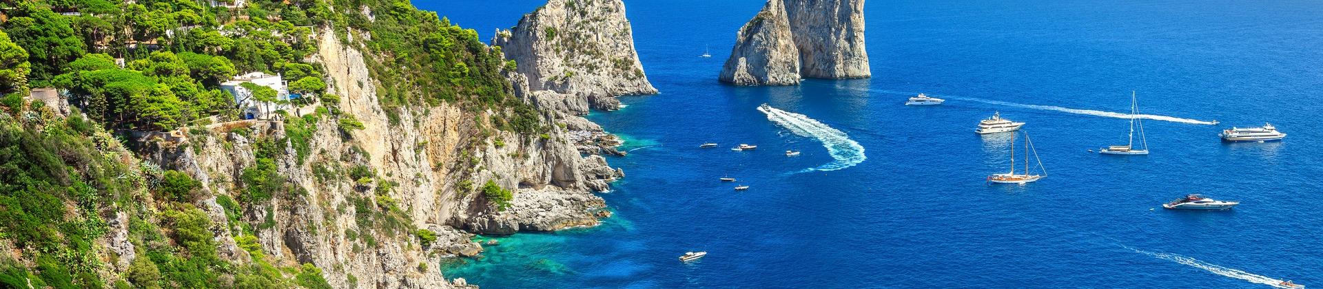 Aerial view of beach in Capri on a sunny day with some clouds