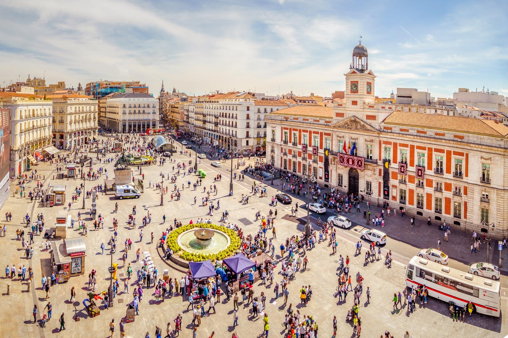 City square in Madrid with cloudy sky