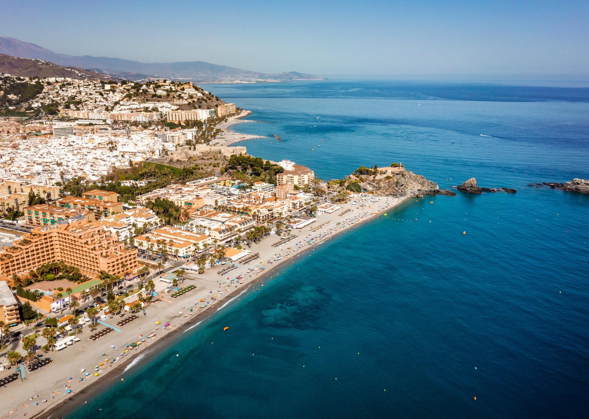 Aerial view of beach in Almunécar on a clear sky day
