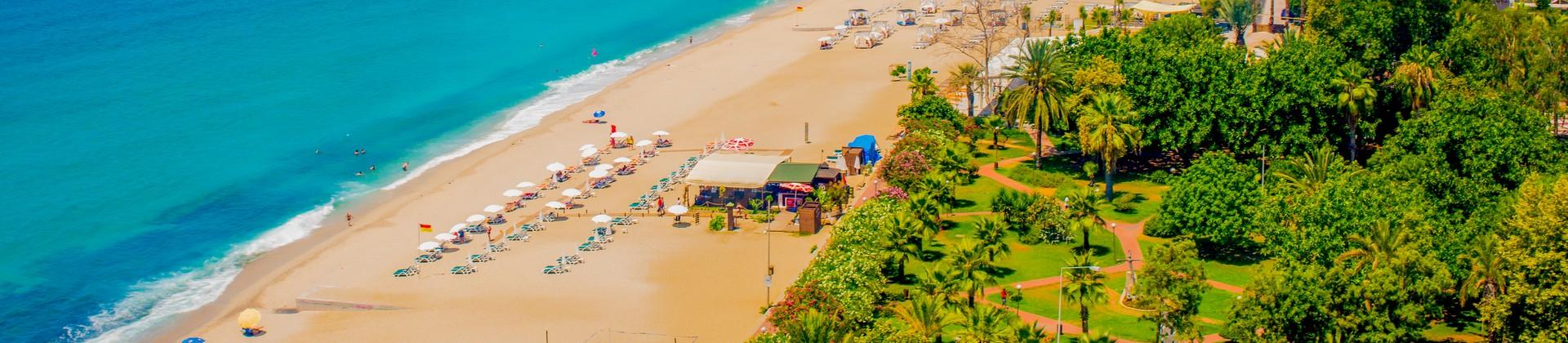 Aerial view of people on the beach in Alanya on a clear sky day