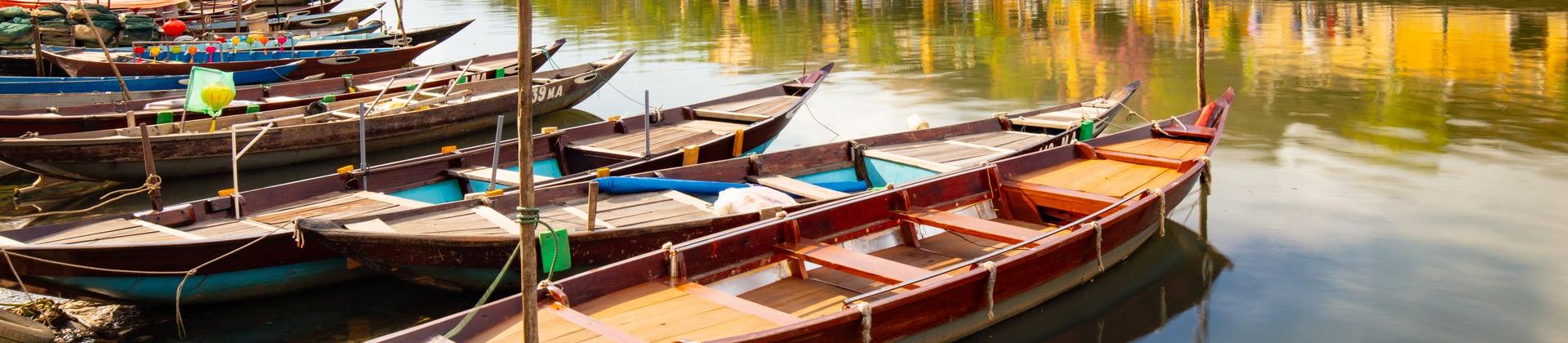 Boat in Hoi An with cloudy sky