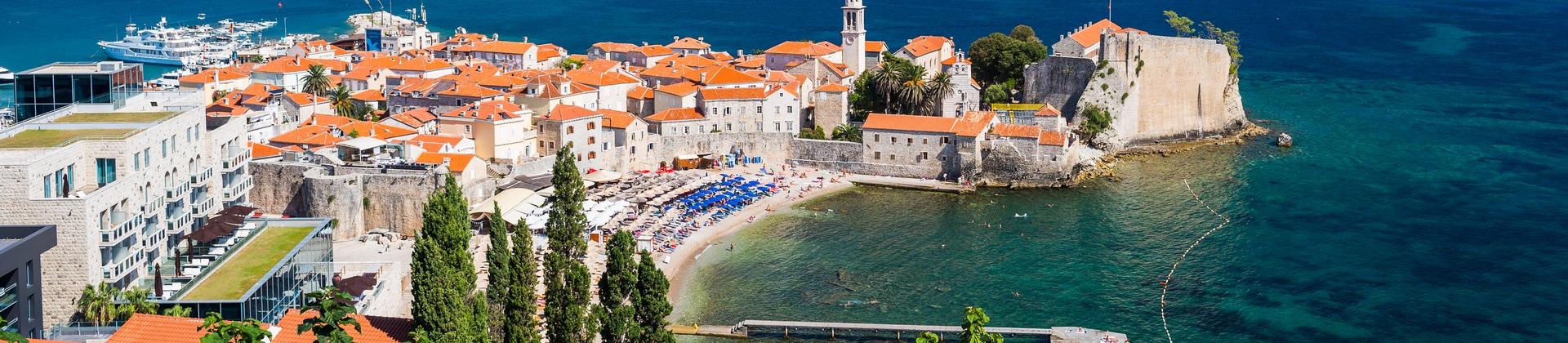 Aerial view of mountain range in Budva on a sunny day