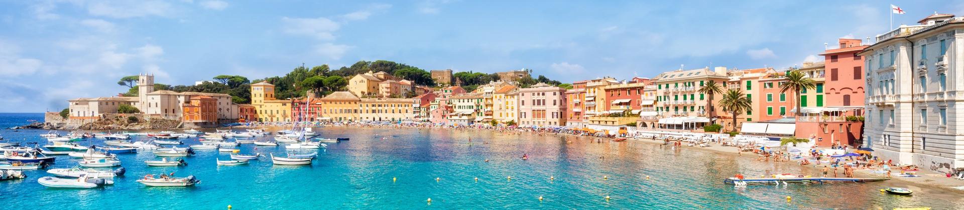 Aerial view of boat in Sestri Levante on a sunny day with some clouds